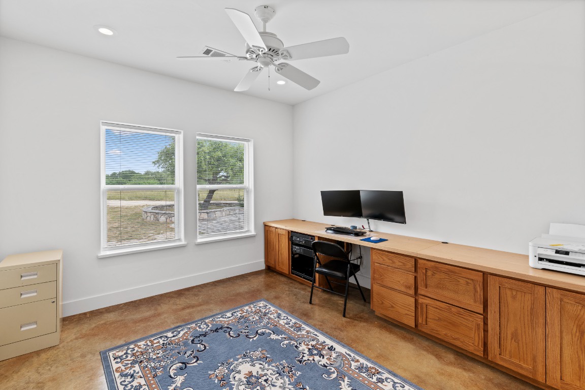 2321 Gentry Creek Road Menard, TX 76859 - Photo 25 of 35 a view of a workspace with furniture and a window