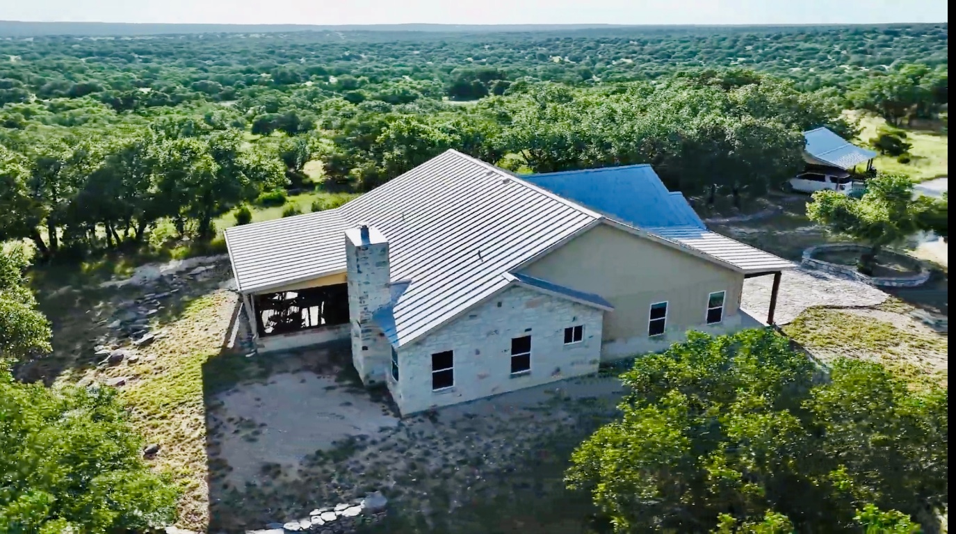 2321 Gentry Creek Road Menard, TX 76859 - Photo 33 of 35 a aerial view of a house with a yard
