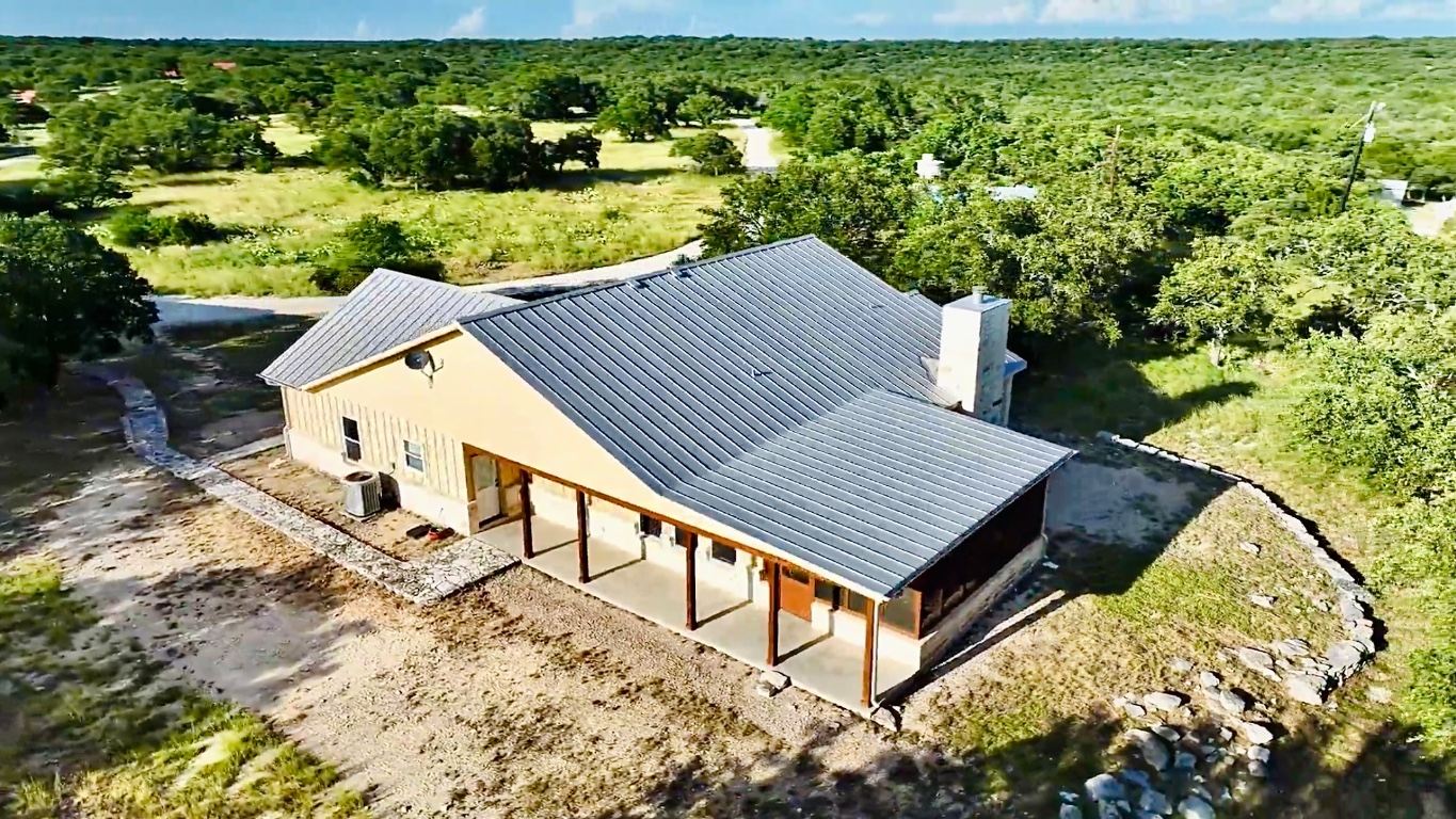2321 Gentry Creek Road Menard, TX 76859 - Photo 34 of 35 a view of a backyard with wooden fence