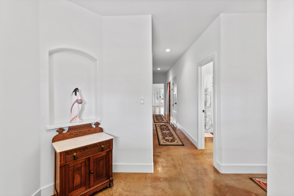 2321 Gentry Creek Road Menard, TX 76859 - Photo 8 of 35 a view of a hallway with utility room