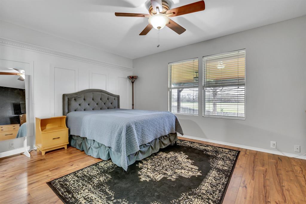 3616 Riesling Drive Denton, TX 76226 - Photo 11 of 18 Bedroom with hardwood / wood-style flooring, baseboards, and a ceiling fan