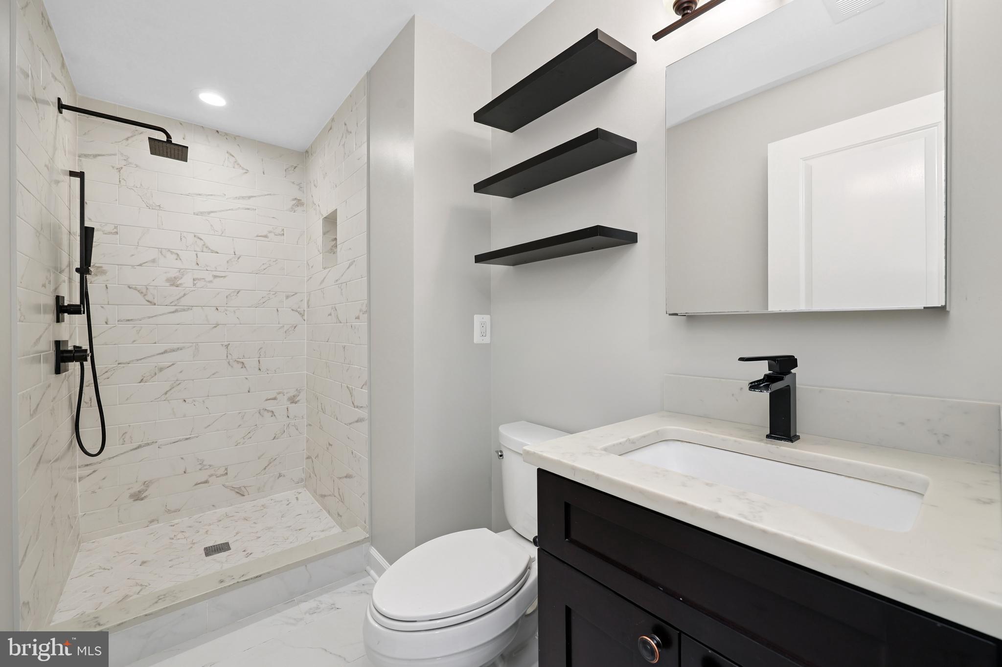 9322 Glenbrook Road Fairfax, VA 22031 - Photo 12 of 39 lower level full bath 3