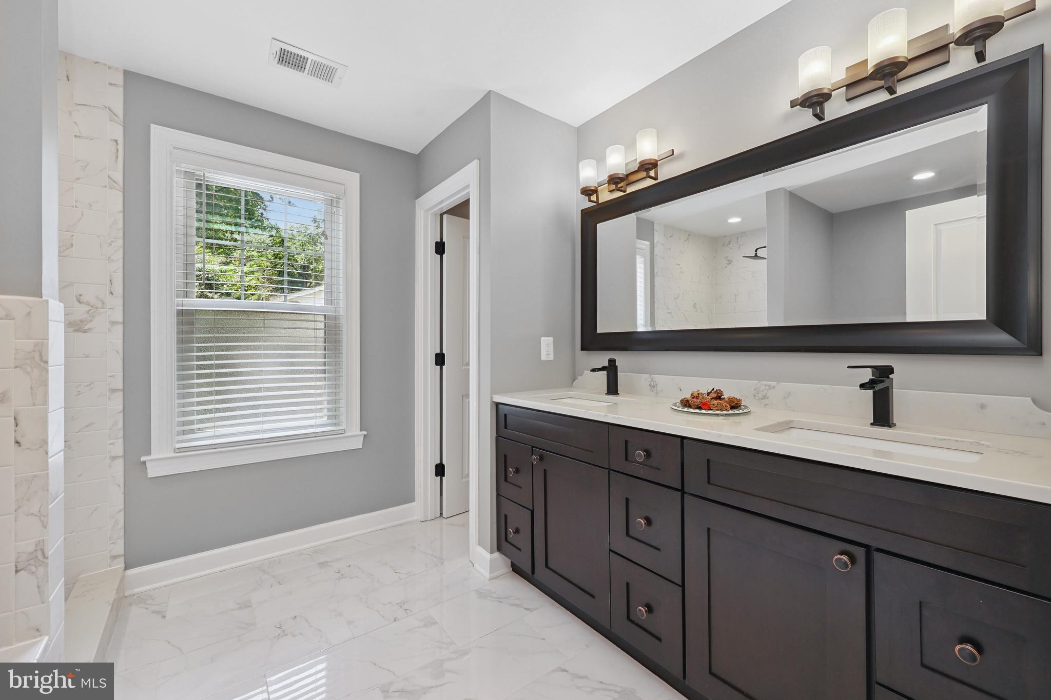 9322 Glenbrook Road Fairfax, VA 22031 - Photo 25 of 39 Dual vanity with quartz countertop