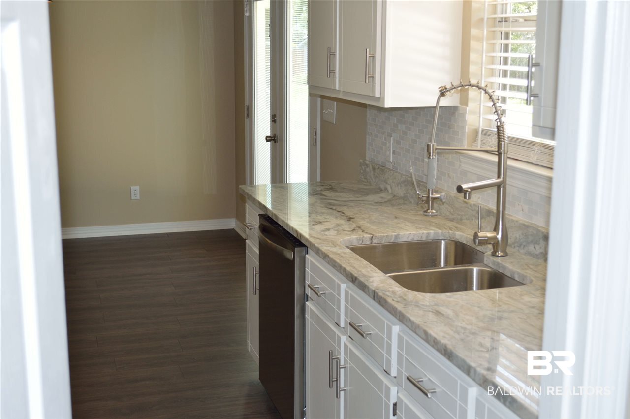 4954 Look Rook Road Orange Beach, AL 36561 - Photo 5 of 32 Back splash, sink and awesome faucet all new!