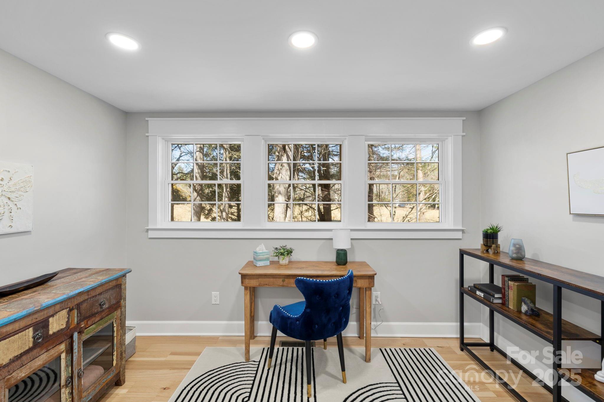 321 Ballenger Road Flat Rock, NC 28731 - Photo 16 of 32 a living room with furniture and a window