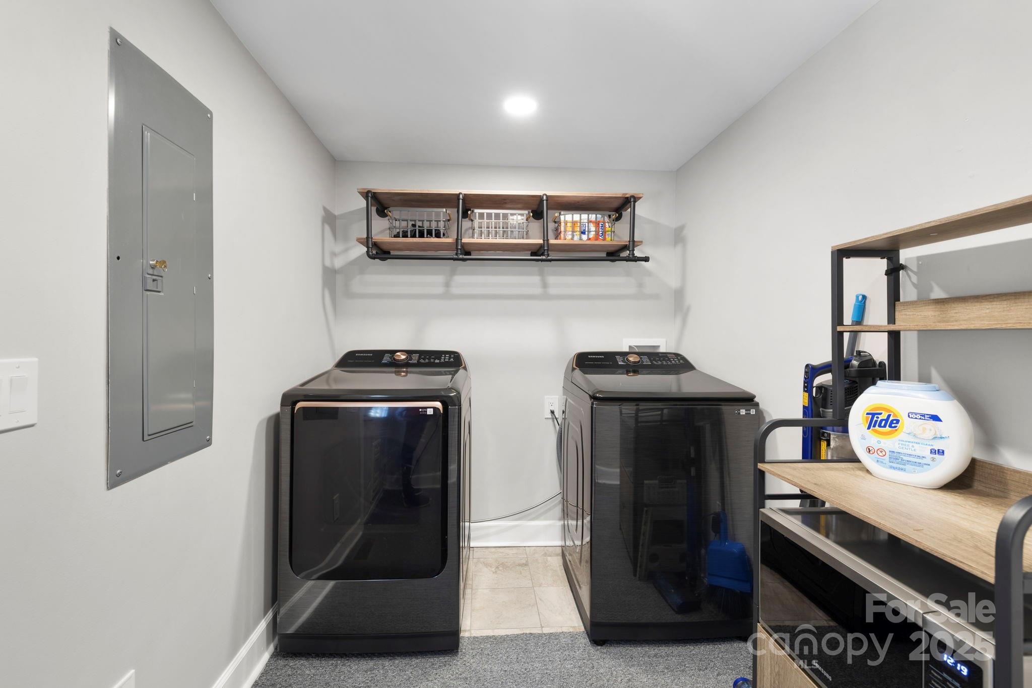 321 Ballenger Road Flat Rock, NC 28731 - Photo 23 of 32 a kitchen with stainless steel appliances granite countertop a refrigerator and a stove