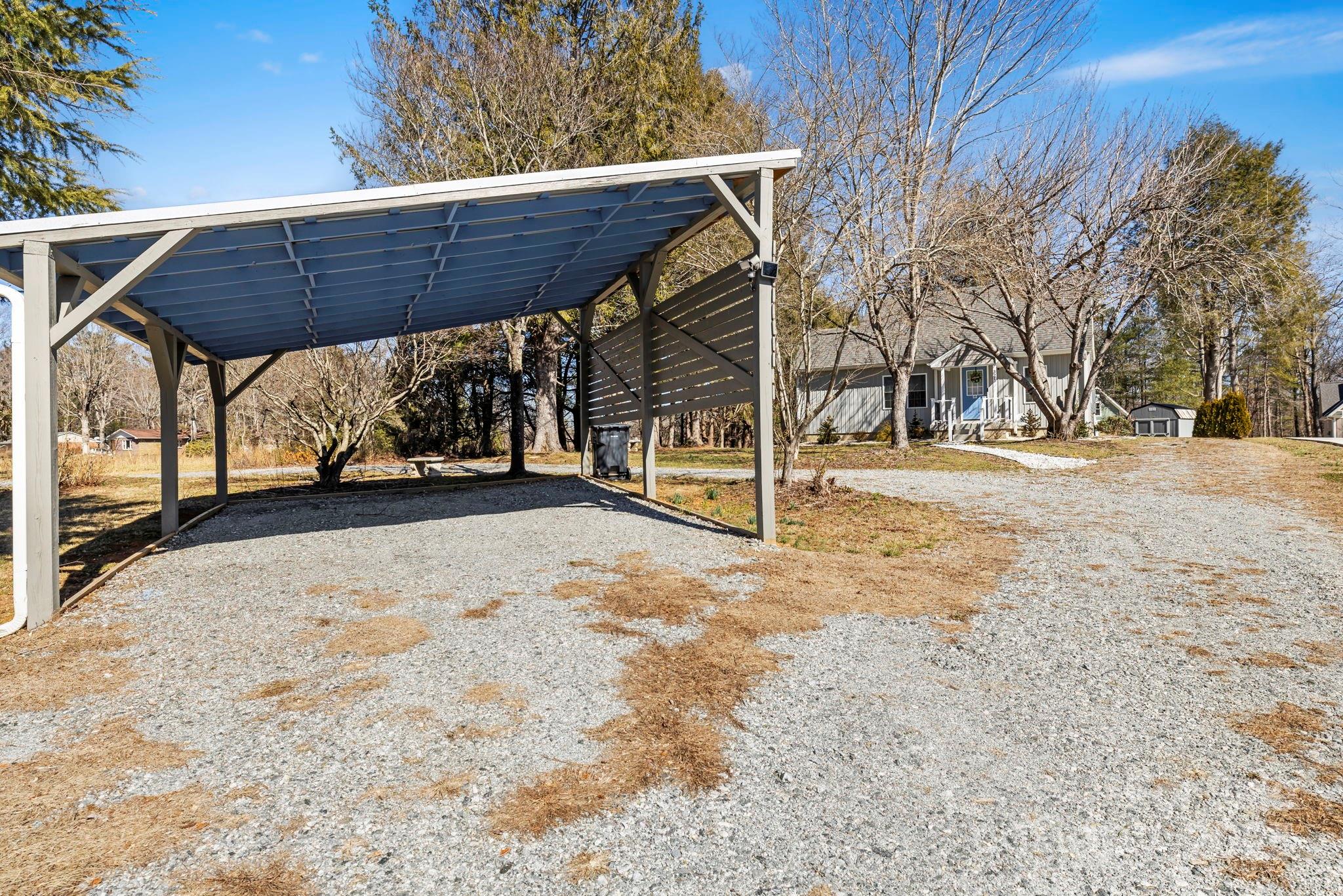321 Ballenger Road Flat Rock, NC 28731 - Photo 29 of 32 a view of wooden house with a yard