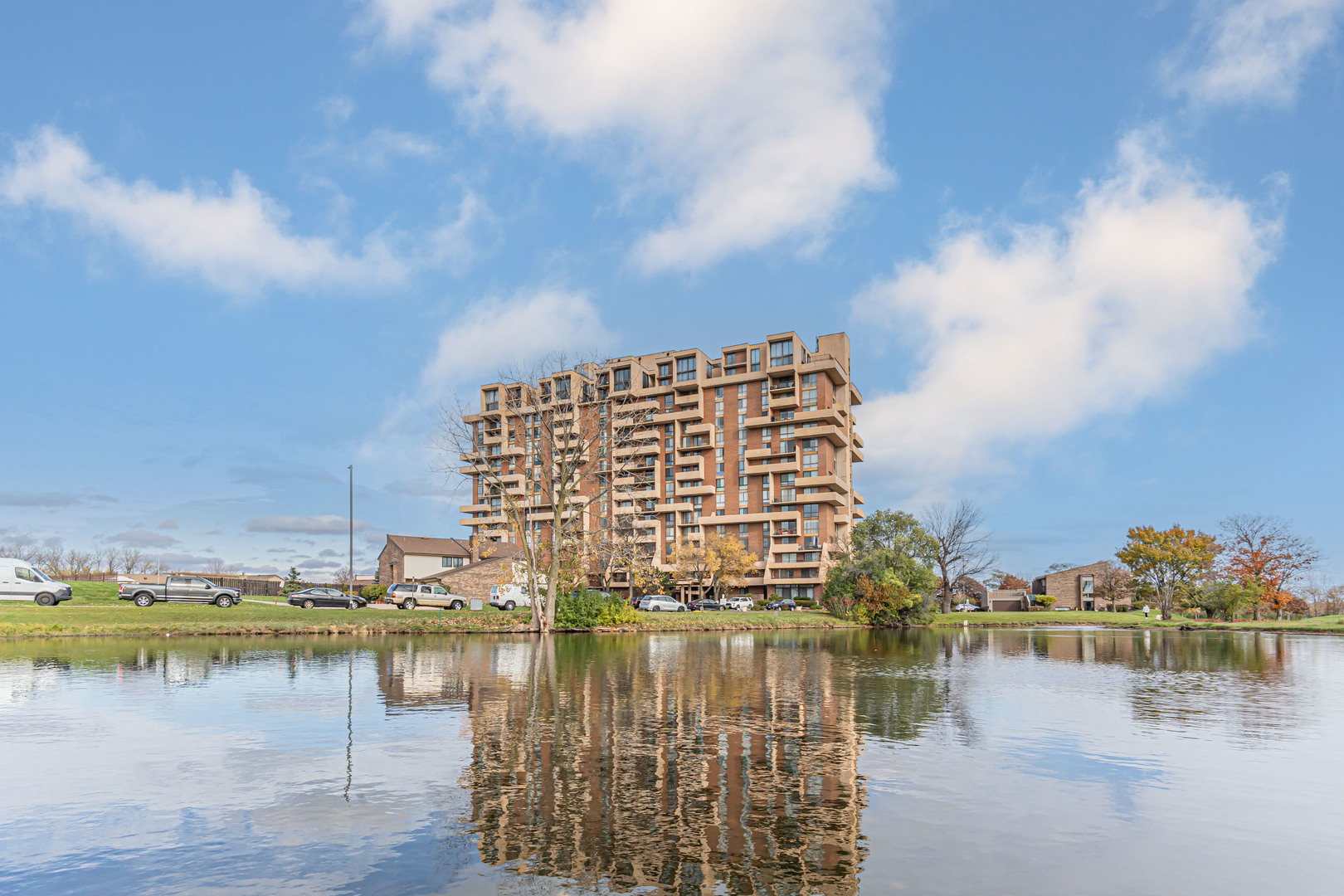a view of lake with green space