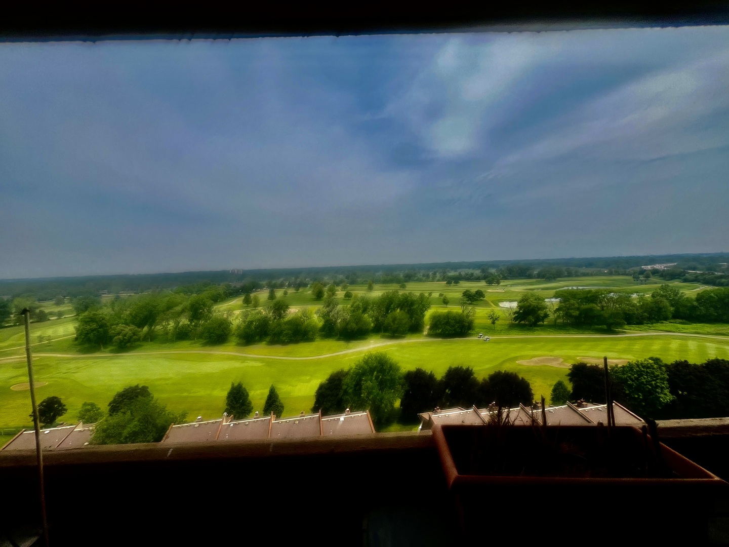 465 West Dominion Drive, Unit 1302 Wood Dale, IL 60191 - Photo 2 of 19 a view of a golf course with a lake view