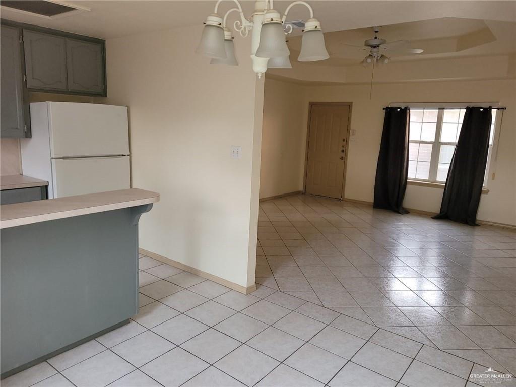 6804 North 8th Street McAllen, TX 78504 - Photo 9 of 11 an empty room with windows and cabinet