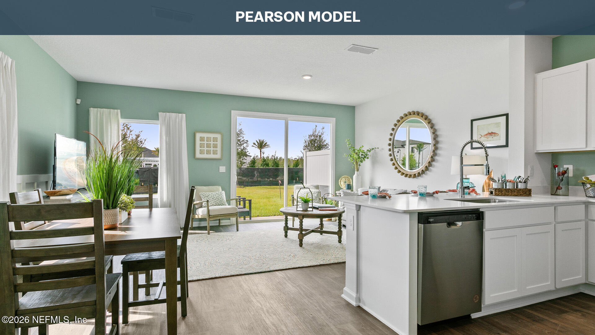 14472 Canter Road Jacksonville, FL 32234 - Photo 1 of 34 a living room with furniture kitchen view and a large window