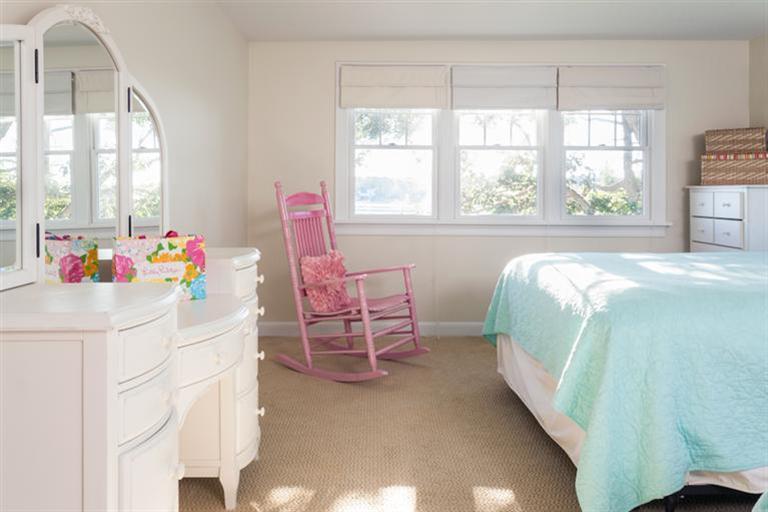 2 Great River Road Mashpee, MA 02649 - Photo 5 of 16 a living room with a bed and a table