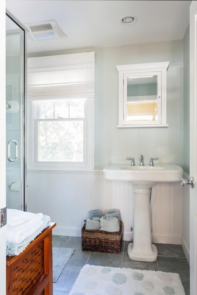 2 Great River Road Mashpee, MA 02649 - Photo 8 of 16 a bathroom with a sink and a mirror