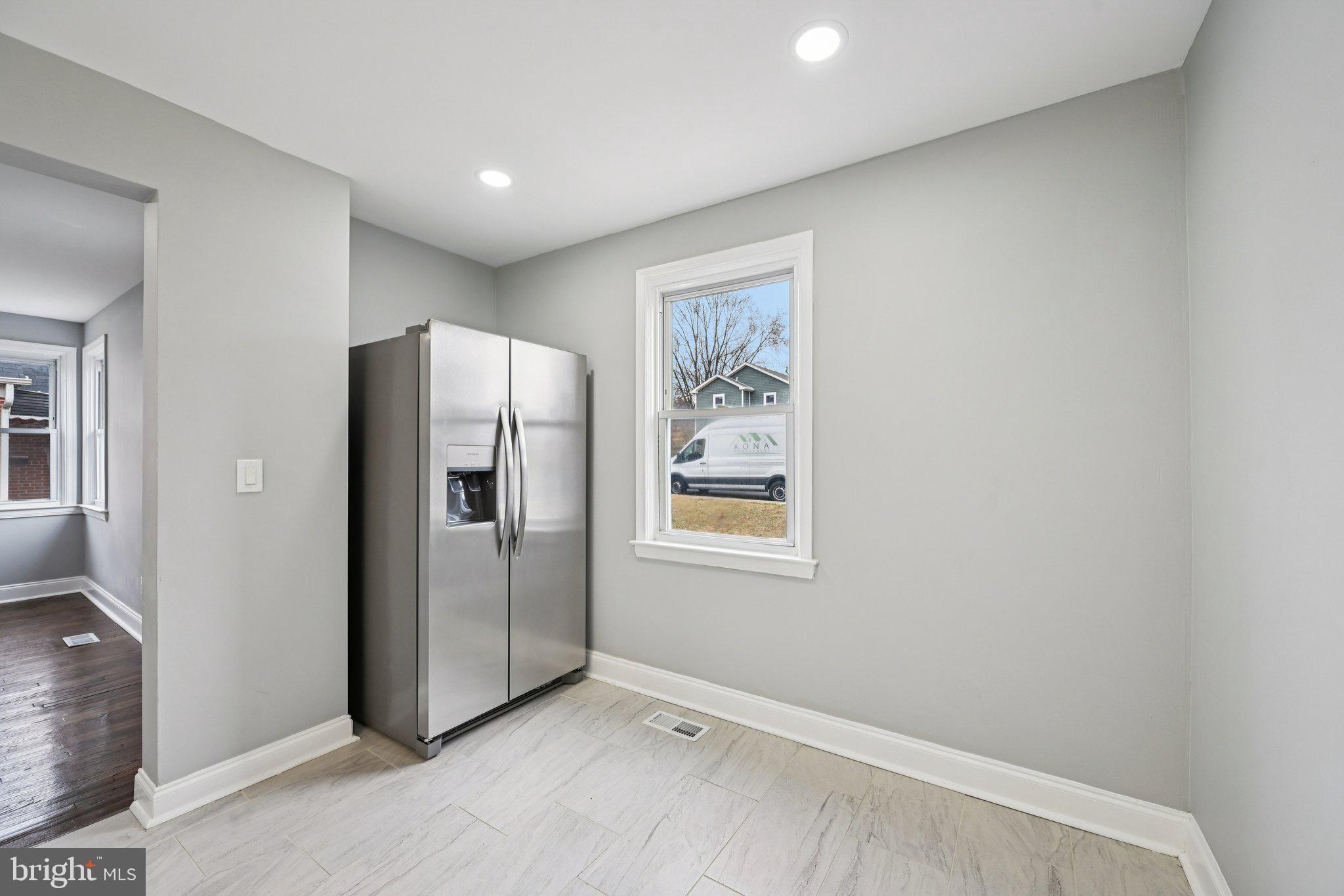 4902 Gilray Drive Baltimore, MD 21214 - Photo 15 of 54 a view of an empty room with a window