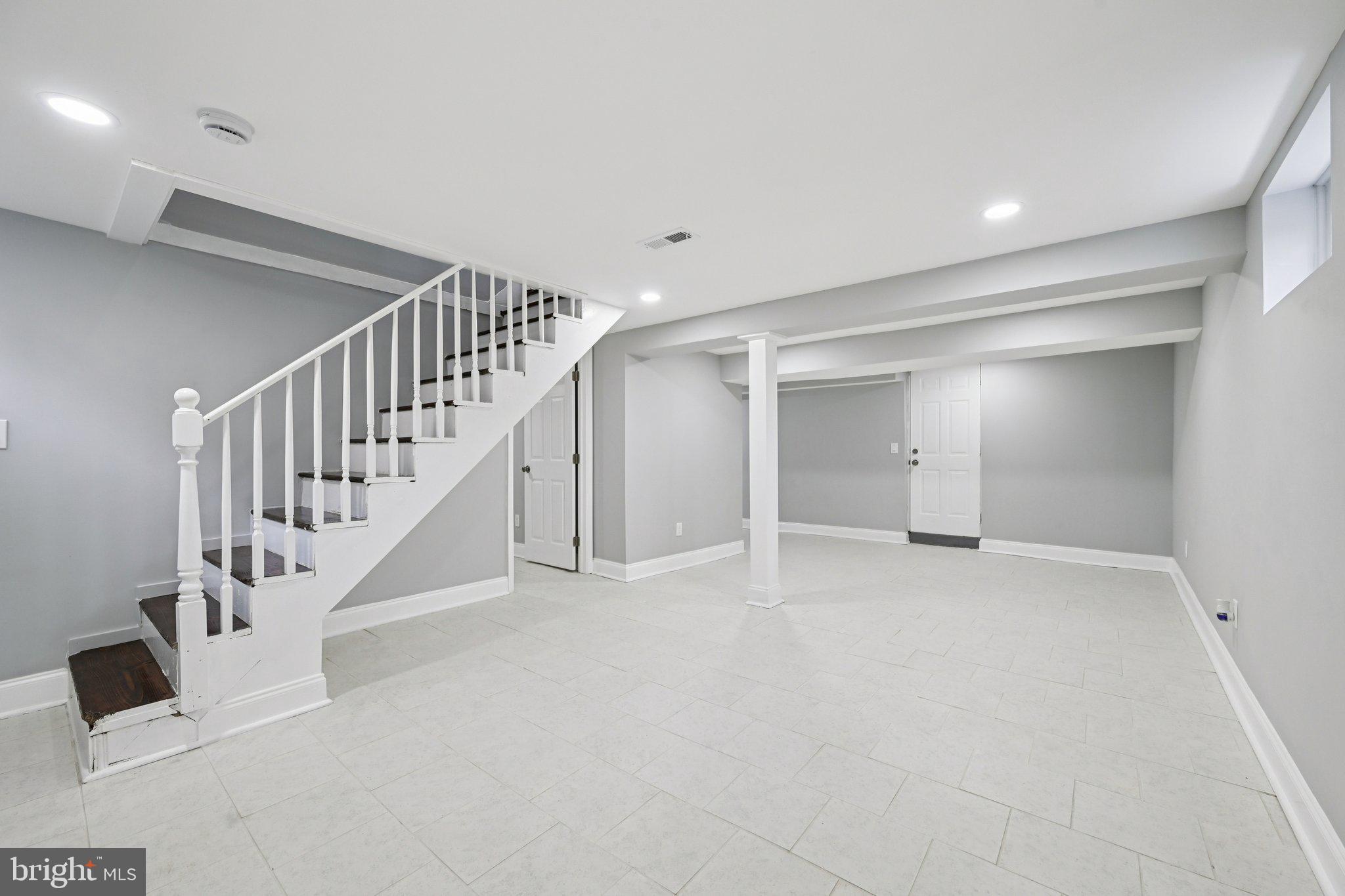 4902 Gilray Drive Baltimore, MD 21214 - Photo 29 of 54 a view of an entryway with stairs