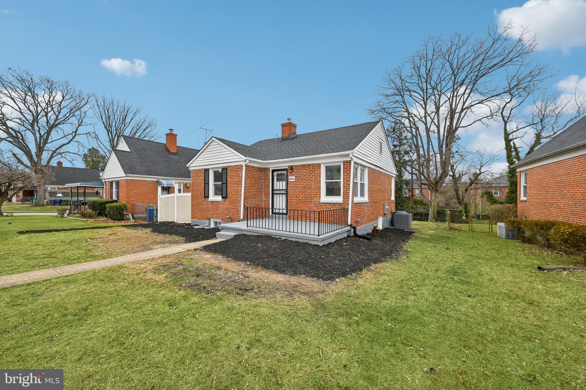 4902 Gilray Drive Baltimore, MD 21214 - Photo 3 of 54 a view of a yard in front of a house