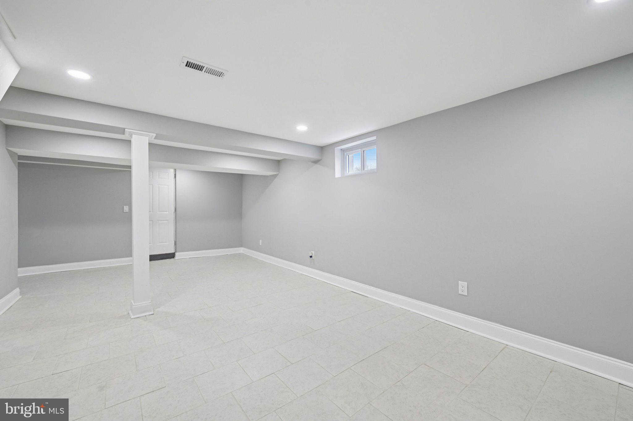 4902 Gilray Drive Baltimore, MD 21214 - Photo 31 of 54 a view of an empty room