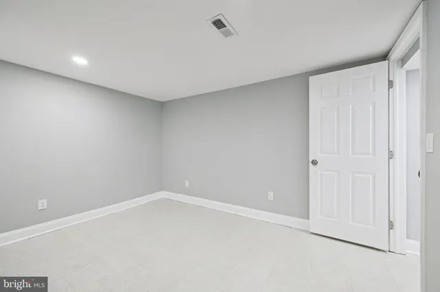 a bathroom with a sink a toilet a shower and a mirror