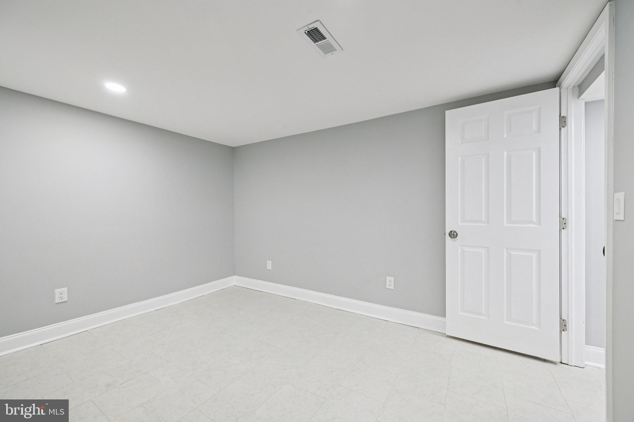 4902 Gilray Drive Baltimore, MD 21214 - Photo 36 of 54 a view of an empty room