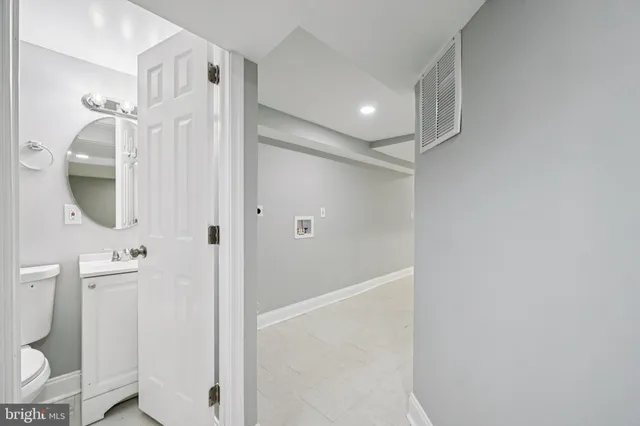 a view of a house with large windows