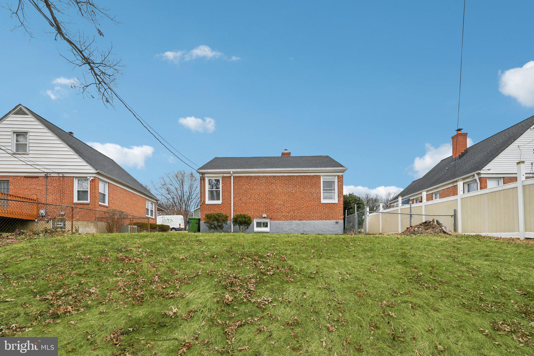 4902 Gilray Drive Baltimore, MD 21214 - Photo 46 of 54 a front view of house with yard