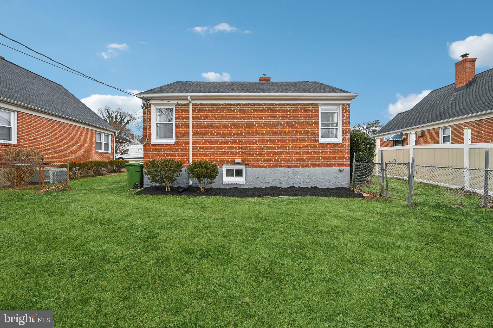 4902 Gilray Drive Baltimore, MD 21214 - Photo 50 of 54 a backyard of a house with lots of green space