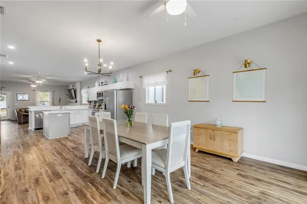 a bedroom with a bed and a bookshelf