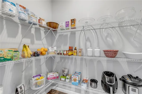 a bathroom with a granite countertop sink toilet tub and shower
