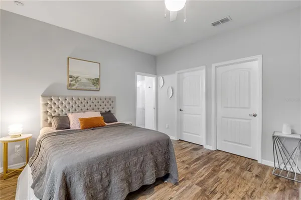 a bathroom with a shower sink and mirror