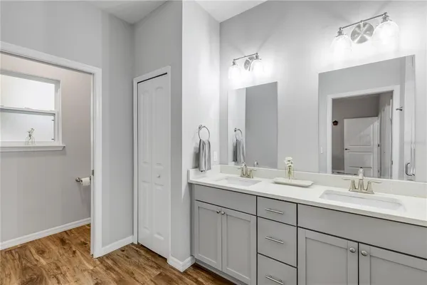 a bedroom with a bed and a table