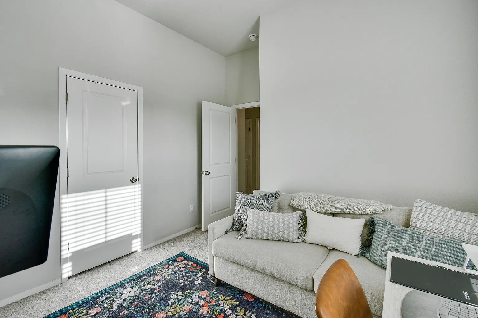 121 Crescent Street Georgetown, TX 78626 - Photo 11 of 27 Living area with carpet floors and a high ceiling