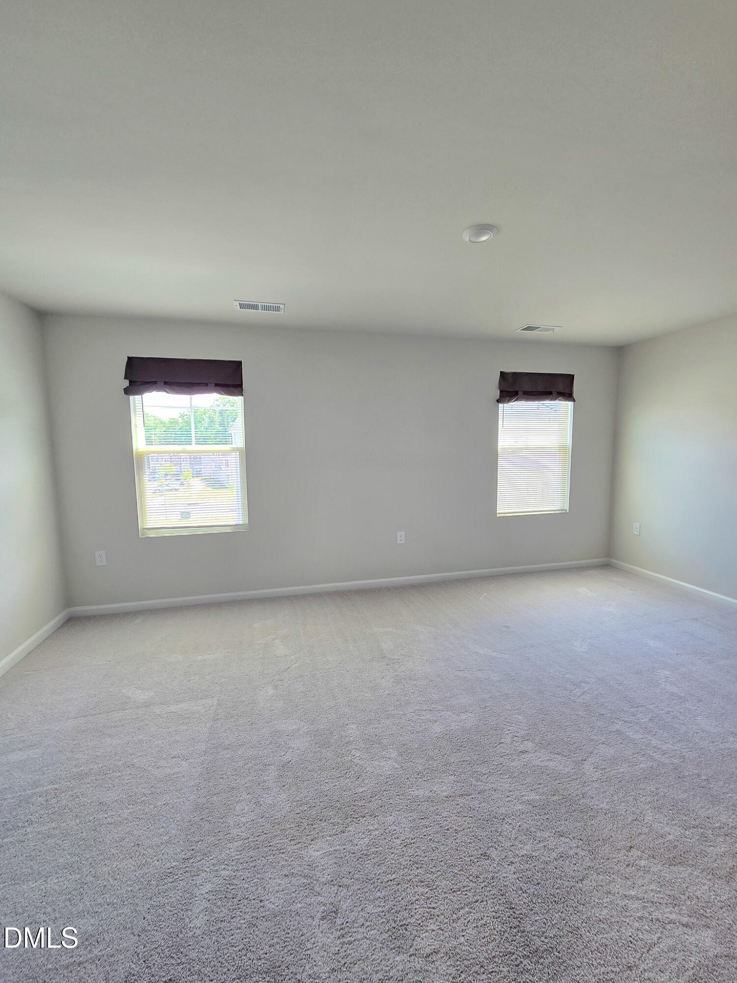 2431 Kasota Lane Raleigh, NC 27610 - Photo 27 of 46 an empty room with a window