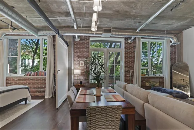 a kitchen with refrigerator and stove