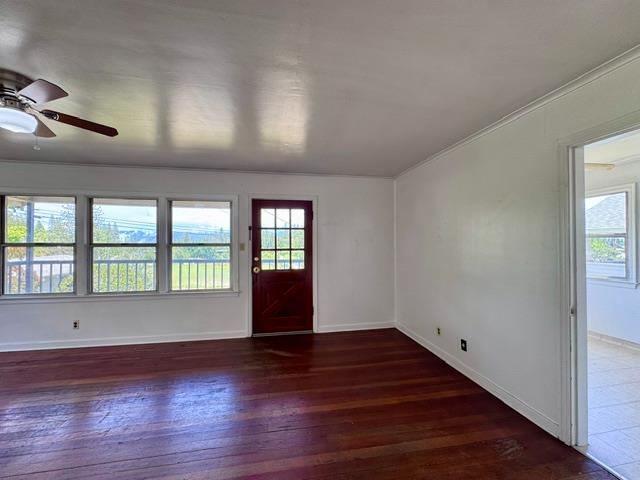 240 Pleasant Street Colfax, CA 95713 - Photo 6 of 26 a view of an empty room with wooden floor and a window
