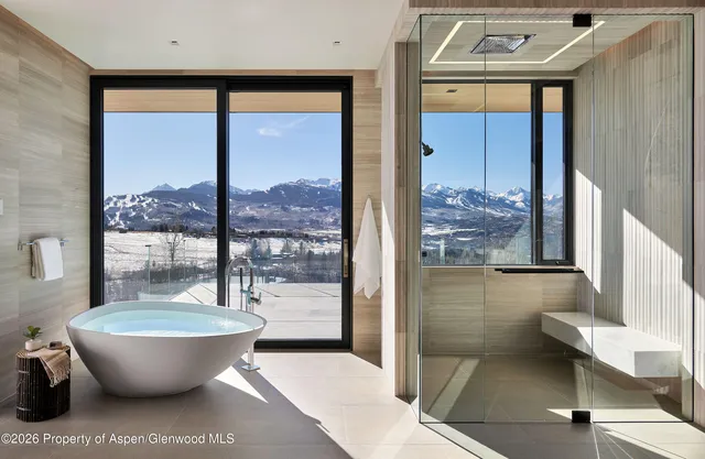 a terrace of a house with outdoor seating