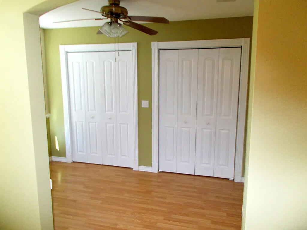1409 East 11th Place Big Spring, TX 79720 - Photo 9 of 12 a view of a front door and wooden floor
