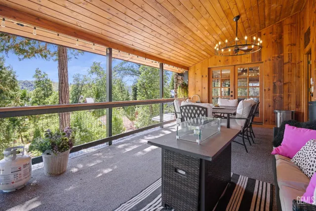 a bedroom with a bed and a mirror