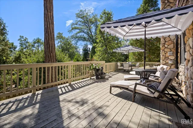 a view of a room with furniture and windows