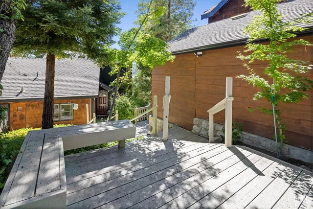 a bedroom with a bed and a table
