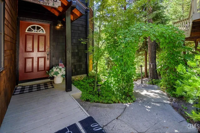a bedroom with a bed and a fireplace