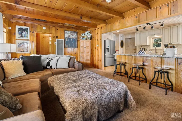 a kitchen with sink cabinets and outdoor view