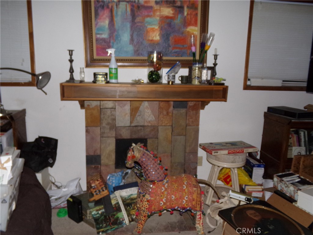 4880 Bonanza Road Johnson Valley, CA 92285 - Photo 6 of 19 a living room with furniture and a fireplace