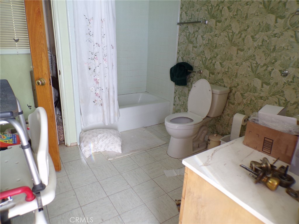 4880 Bonanza Road Johnson Valley, CA 92285 - Photo 9 of 19 a bathroom with a toilet and a shower