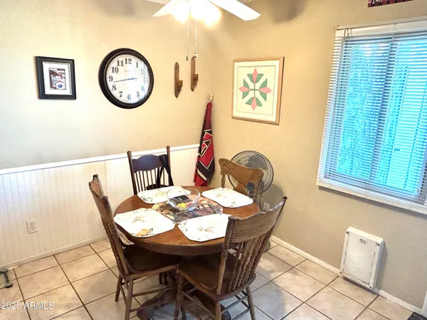 a living room with hard wood flooring