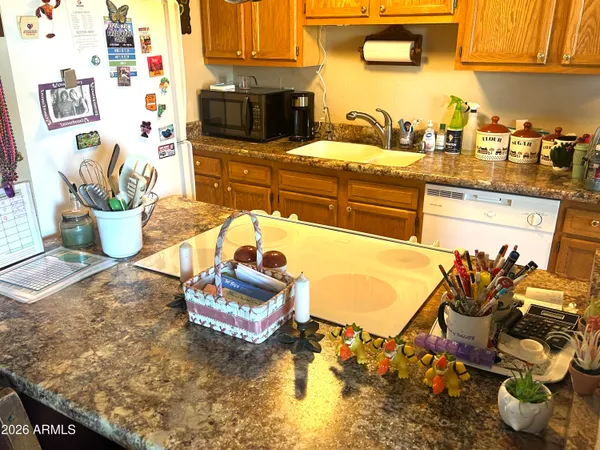 a kitchen with a table and chairs
