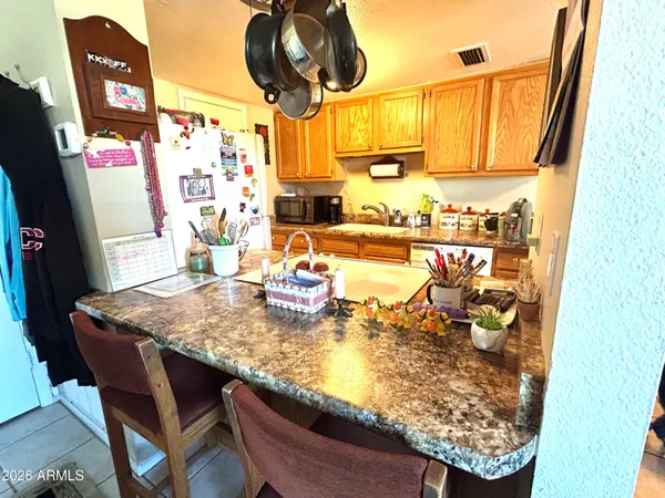 a utility room with a sink a washer and dryer