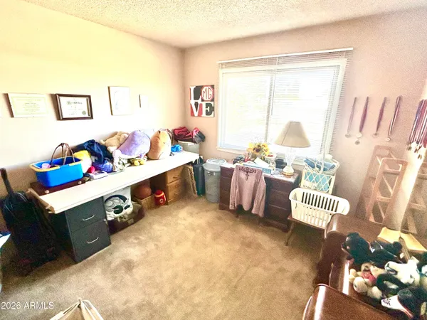 a room with toys and white walls