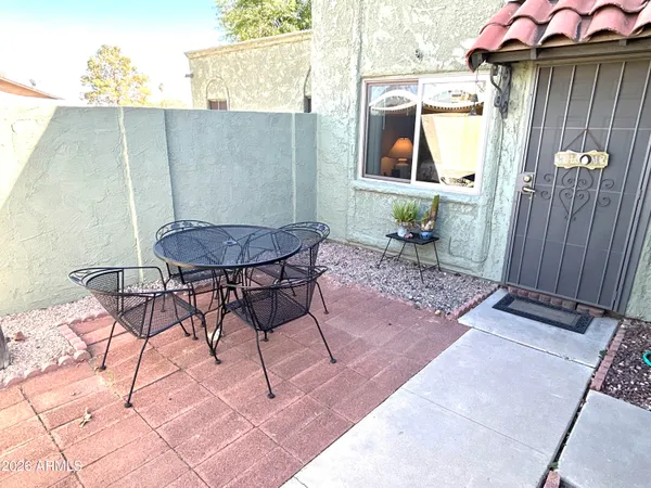 a view of a door and chair and door in the porch