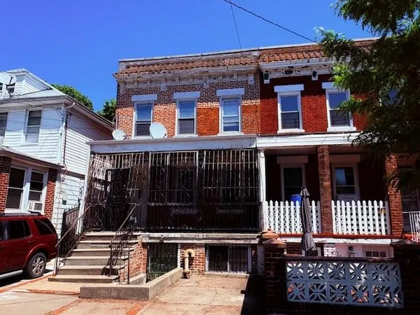 a front view of a house with balcony