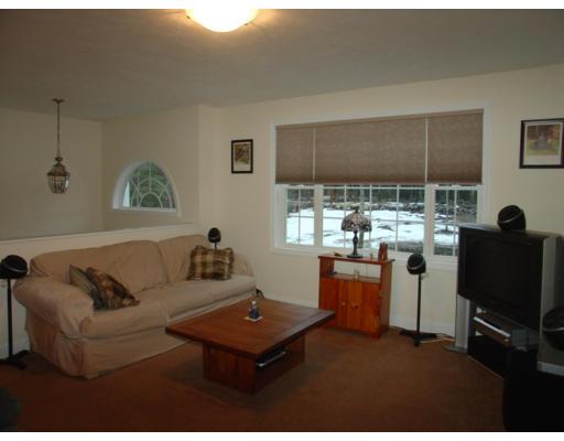 385 Williamsville Road Phillipston, MA 01331 - Photo 5 of 18 a living room with furniture a flat screen tv and large window